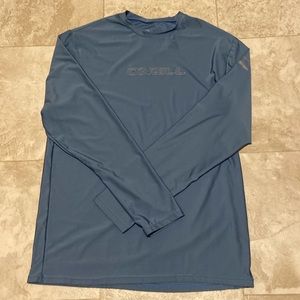 Like new corn blue O’Neill rash guard, size XL slim fit